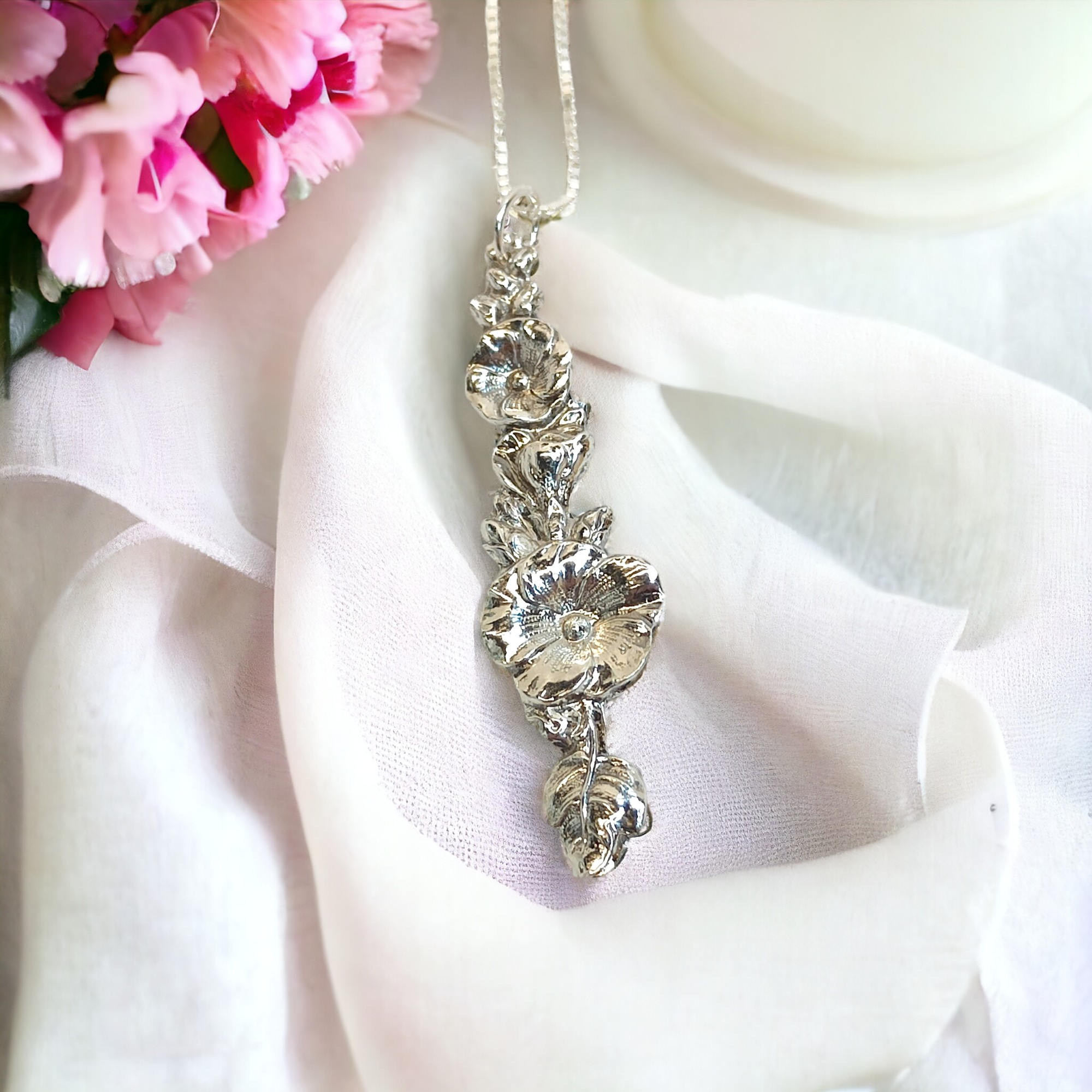 woman wearing a silver necklace