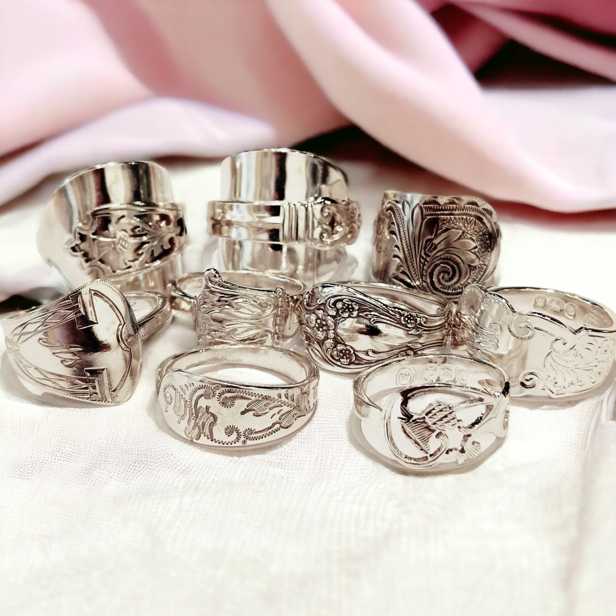 A group of silver rings